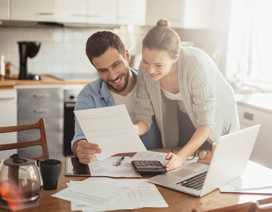 couple looking at paperwork together